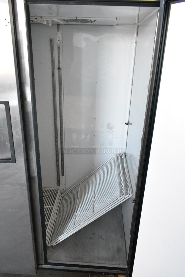 True TG2R-2S ENERGY STAR Stainless Steel Commercial 2 Door Reach In Cooler w/ Poly Coated Racks on Commercial Casters. 115 Volts, 1 Phase. Tested and Working! - Image 5 of 6