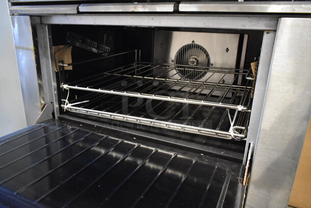 2016 Garland G36-6C Stainless Steel Commercial Natural Gas Powered 4 Burner Range w/ Left Side Flat Top and Convection Oven. - Image 5 of 7