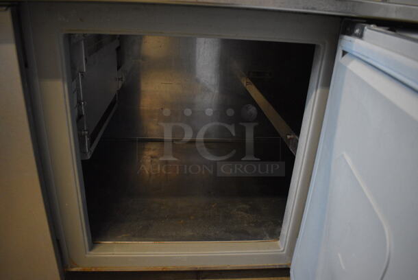 Randell Stainless Steel Commercial Prep Table on Commercial Casters. 115 Volts, 1 Phase. 120x34x51. Tested and Powers On But Temps at 50 Degrees - Image 8 of 12