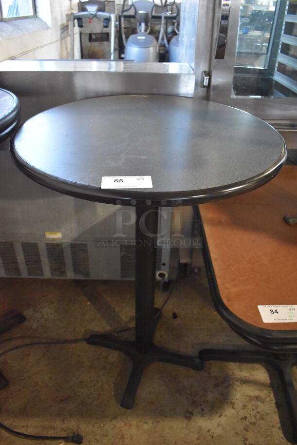 Gray Round Bar Height Table on Black Metal Table Base. 30x30x42