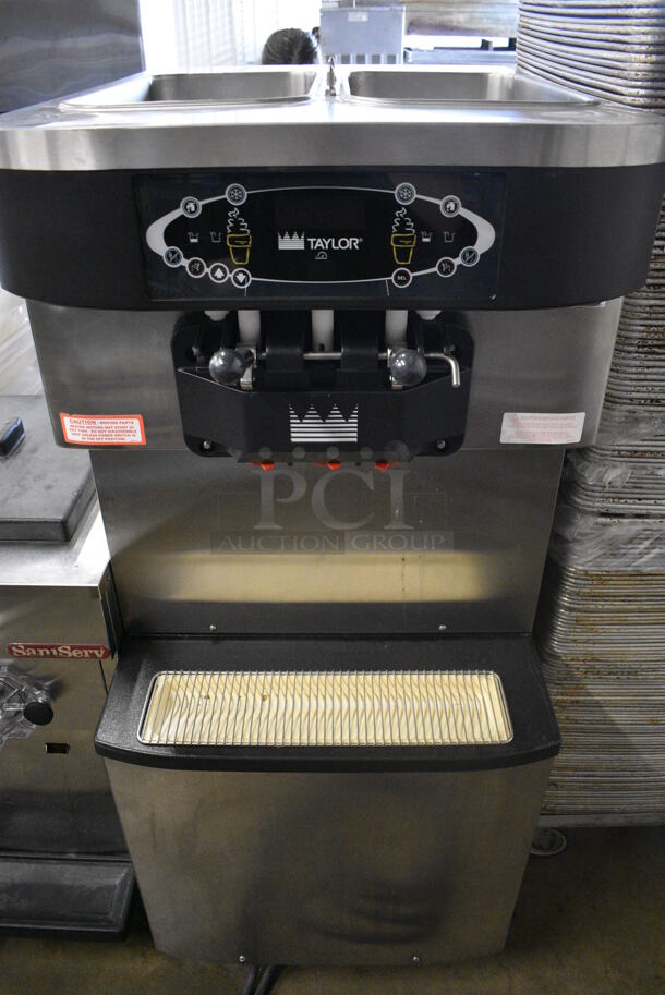 2012 Taylor Model C713-33 Stainless Steel Commercial Floor Style Water Cooled 2 Flavor w/ Twist Soft Serve Ice Cream Machine on Commercial Casters. 208-230 Volts, 3 Phase. 25.5x36x59 - Image 1 of 6
