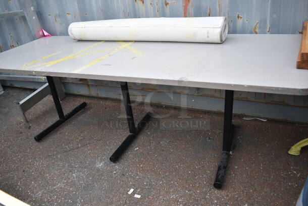 Gray Dining Height Table on 3 Straight Leg Metal Bases.  - Image 1 of 4