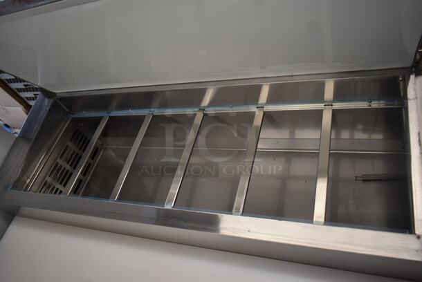 BRAND NEW SCRATCH AND DENT! 2023 Avantco 178SSPPT3 Stainless Steel Commercial Refrigerated Pizza Prep Table on Commercial Casters. 115 Volts, 1 Phase. Tested and Working! - Image 7 of 12