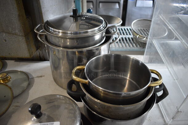 ALL ONE MONEY! Lot of 9 Various Items; Stock Pots, Sauce Pans and Skillet w/ 3 Various Lids. Includes 11.5x8x4 - Image 2 of 4