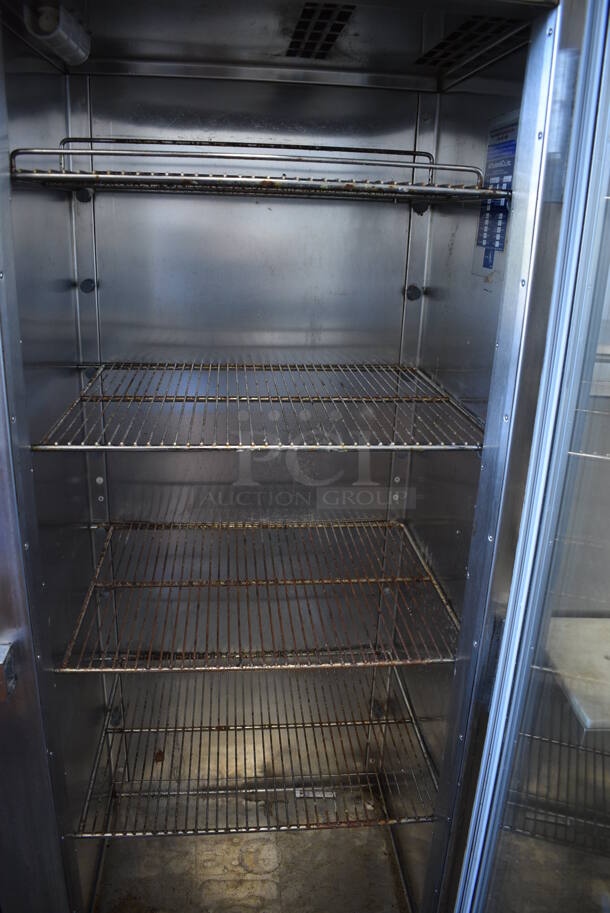 Traulsen UR 30 WT Stainless Steel Commercial Single Door Reach In Cooler Merchandiser w/ Racks on Commercial Casters. 115 Volts, 1 Phase. 30x27x82. Tested and Working! - Image 4 of 5
