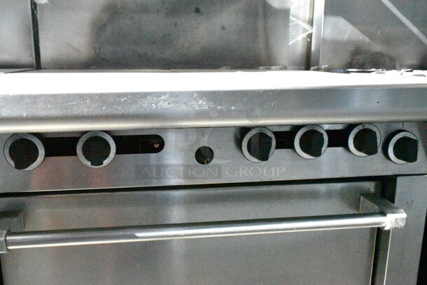Garland M45R Stainless Steel Commercial Natural Gas Powered Flat Top w/ Oven, Over Shelf and Back Splash on Commercial Casters.  - Image 4 of 8