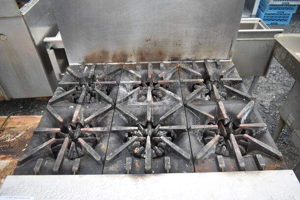 Garland G36-6R Stainless Steel Commercial Natural Gas Powered 6 Burner Range w/ Oven and Back Splash. - Image 4 of 7