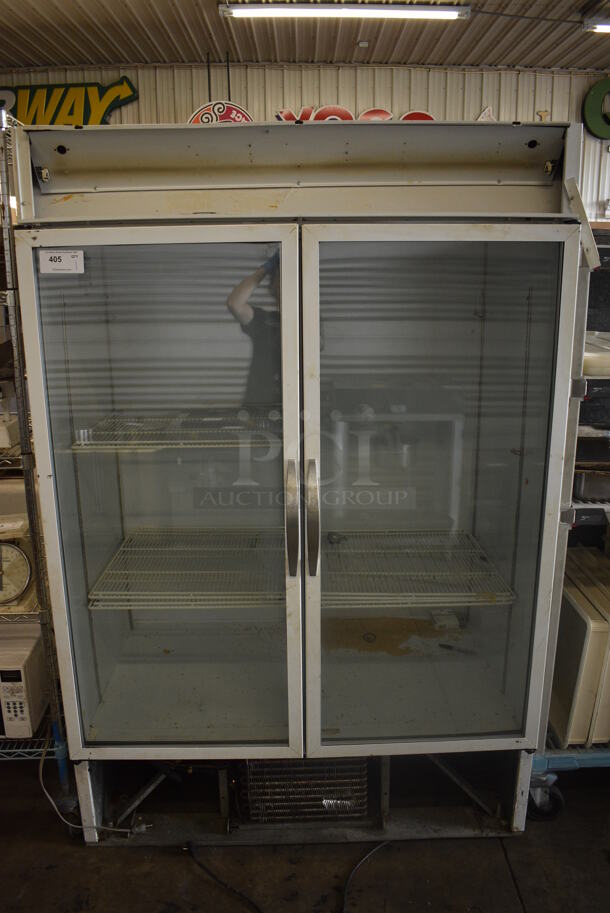 Beverage Air Model MT49-W-55 Metal Commercial 2 Door Reach In Cooler Merchandiser w/ Poly Coated Racks. 115 Volts, 1 Phase. 52x34x78. Tested and Powers On But Does Not Get Cold