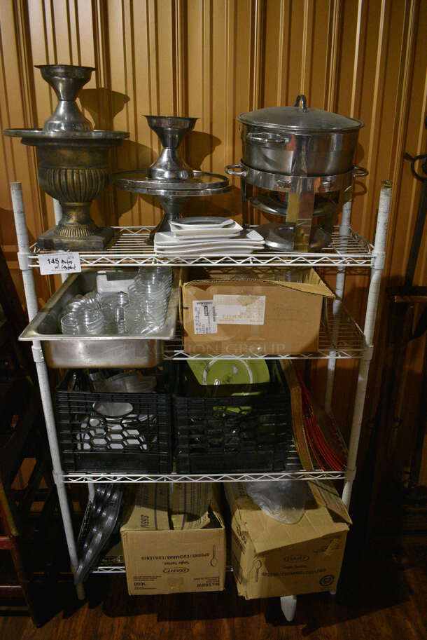 White Finish 4 Tier Shelving Unit w/ Contents Including Chafing Dish Frames, Cake Stands, Glass Bowls. BUYER MUST REMOVE. BUYER MUST DISMANTLE. PCI CANNOT DISMANTLE FOR SHIPPING. PLEASE CONSIDER FREIGHT CHARGES. 36x14x55. (bar)