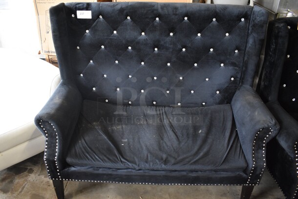 Black Chair w/ Arm Rests and Nail Head Trim. 59x30x50