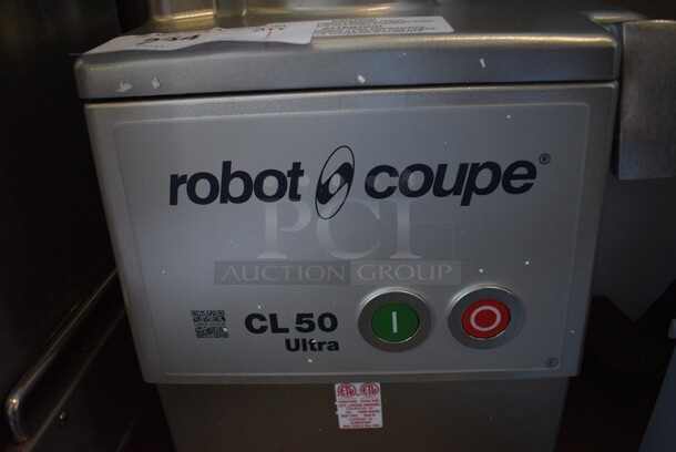BRAND NEW IN BOX! Robot Coupe Model CL50 U Series E Metal Commercial Countertop Continuous Feed Food Processor w/ 2 Gray Poly Blade Holders, 28058 Grater Blade and 28064W Slicing Blade. 120 Volts, 1 Phase. 14x12x24. Tested and Working! - Image 8 of 11