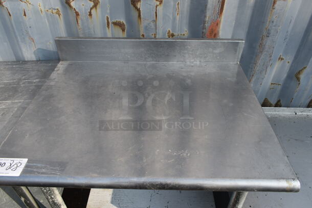 Stainless Steel Commercial Table w/ Back Splash and Under Shelf. - Image 2 of 4