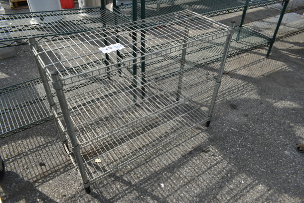 Chrome Finish 3 Tier Wire Shelving Unit. BUYER MUST DISMANTLE. PCI CANNOT DISMANTLE FOR SHIPPING. PLEASE CONSIDER FREIGHT CHARGES.
 - Image 2 of 2