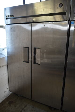 2013 True TG2R-2S ENERGY STAR Stainless Steel Commercial 2 Door Reach In Cooler w/ Poly Coated Racks on Commercial Casters. 115 Volts, 1 Phase. Tested and Working!