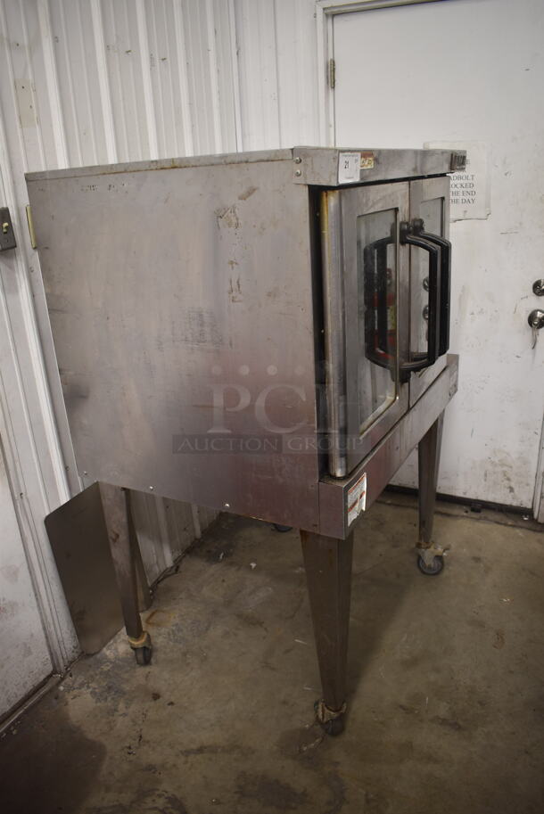 Vulcan VC4GD-11D150K Commercial Stainless Steel Single Deck Natural Gas Convection Oven On Galvanized Legs With Commercial Casters.  - Image 2 of 6