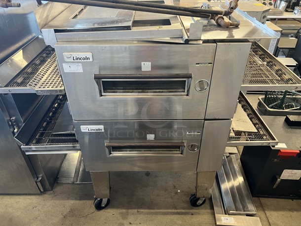 2 2014 Lincoln Impinger Model 1600-000-U-K1969 Stainless Steel Commercial Natural Gas Powered Conveyor Pizza Ovens on Commercial Casters. 110,000 BTU. 80x62x64. 2 Times Your Bid!