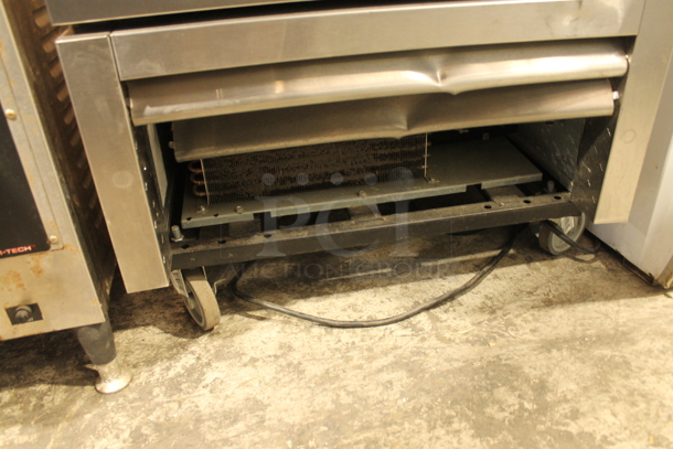 2018 True T-23-HC Stainless Steel Commercial Single Door Reach In Cooler w/ Poly Coated Racks on Commercial Casters. 115 Volts, 1 Phase. Tested and Working!
 - Image 4 of 6