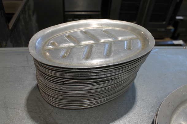 37 Metal Oval Plates; 32 Small and 5 Large. 7x10.5x0.5, 8.5x12.5x1. 37 Times Your Bid! - Image 3 of 3