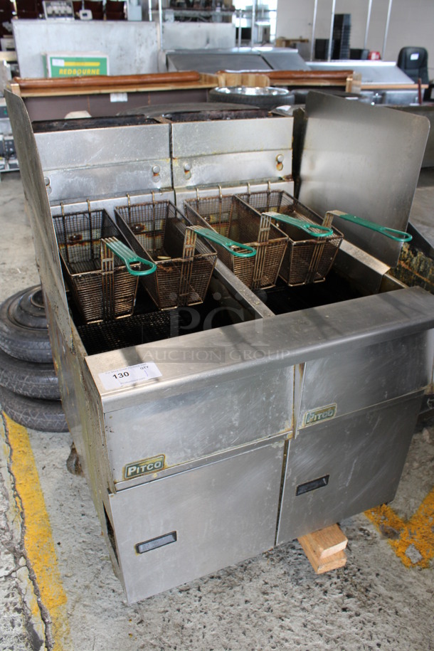 Pitco Frialator Stainless Steel Commercial Natural Gas Powered 2 Bay Fryer w/ 4 Fry Baskets and 2 Side Splash Guards on Commercial Casters. 31.5x35x50 - Image 2 of 10