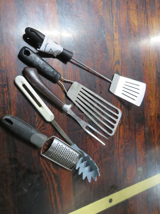One Lot Of Assorted Utensils.
