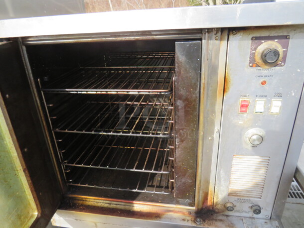 One Market Forge Half Size Electric Convection Oven One Stainless Table With Under Shelf On Casters. Model# 4200. 230 Volt. 1 Phase. 30X30X53 - Image 2 of 2