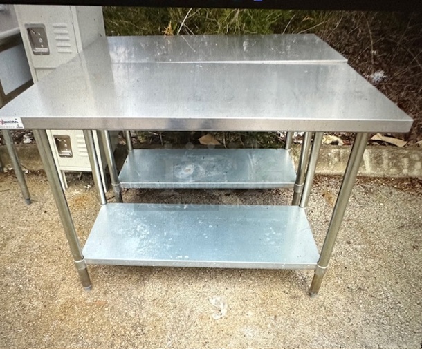 One Omcan Stainless Steel Table With Under SHelf. Model$# 23066. 48X24X34.5