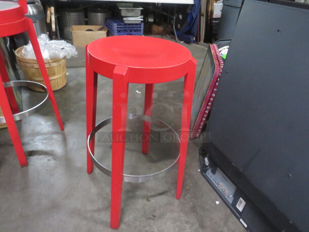Wooden Bar Stool Painted Red With A Metal Foot Rest. 2XBID - Image 1 of 3