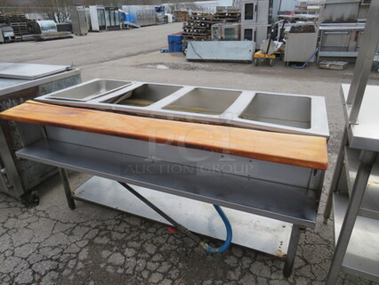 One 4 Well Natural Gas Steam Table With SS Under Shelf, And Wooden Cutting Board. 64X31X34