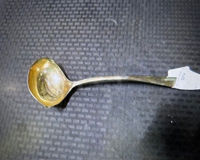 One Silver Plated Ladle.