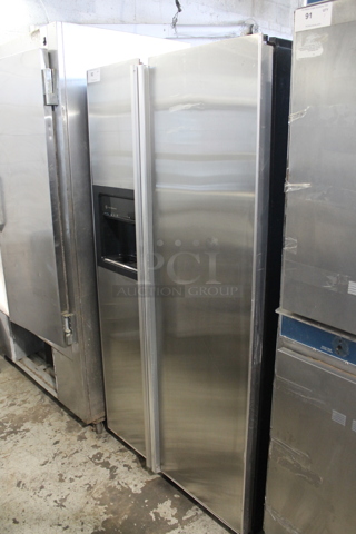 General Electric GE Stainless Steel Cooler Freezer Combo w/ Water and Ice Dispenser. Tested and Powers On But Does Not Get Cold