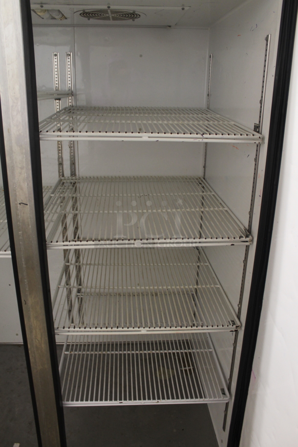 2014 True TG2R-2S ENERGY STAR Stainless Steel Commercial 2 Door Reach In Cooler w/ Poly Coated Racks on Commercial Casters. 115 Volts, 1 Phase. Tested and Working! - Image 5 of 6