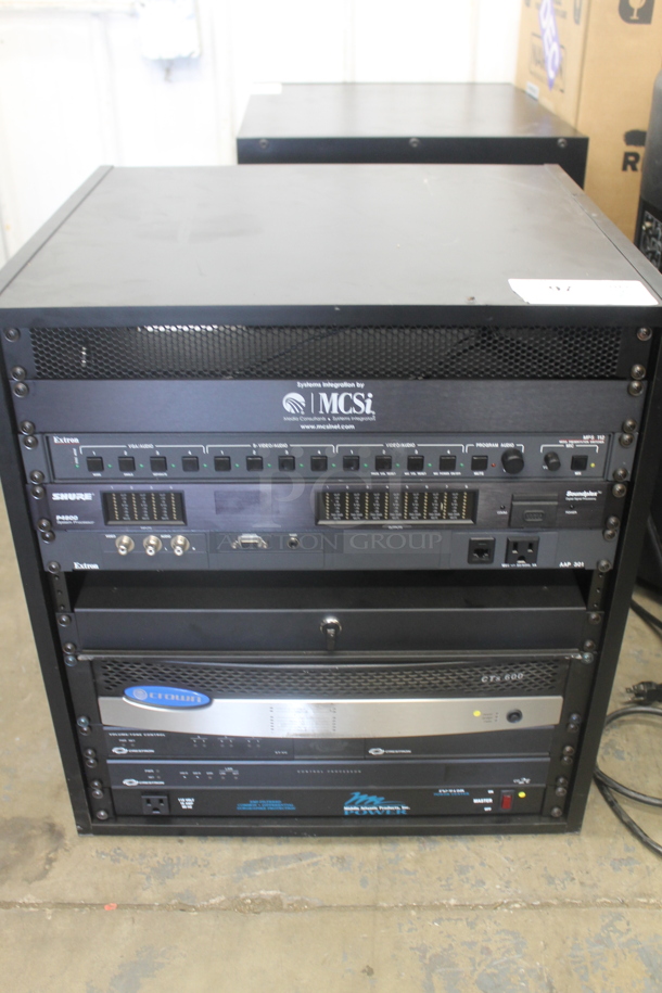7 Electronic Rack Units in Black Metal Cabinet; Middleby Atlantic Power Center, Crestron Control Processor, Crestron Volume Tone Control, Crown CTs 600, Extron AAP 301 Interface Extron Media Presentation Switcher, Shure P4800 System Processor. 7 Times Your Bid!   - Image 1 of 12