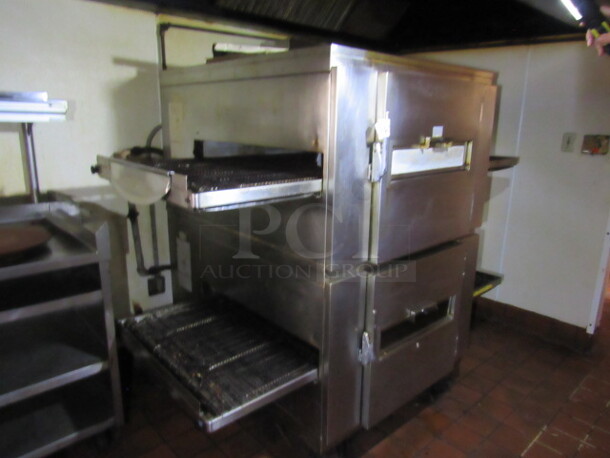 One Stainless Steel Double Stack Lincoln Impinger Natural Gas Conveyor Pizza Oven On Casters. 1000 HP Series. 76X53X74. NICE!!! BUYER MUST REMOVE!!!
