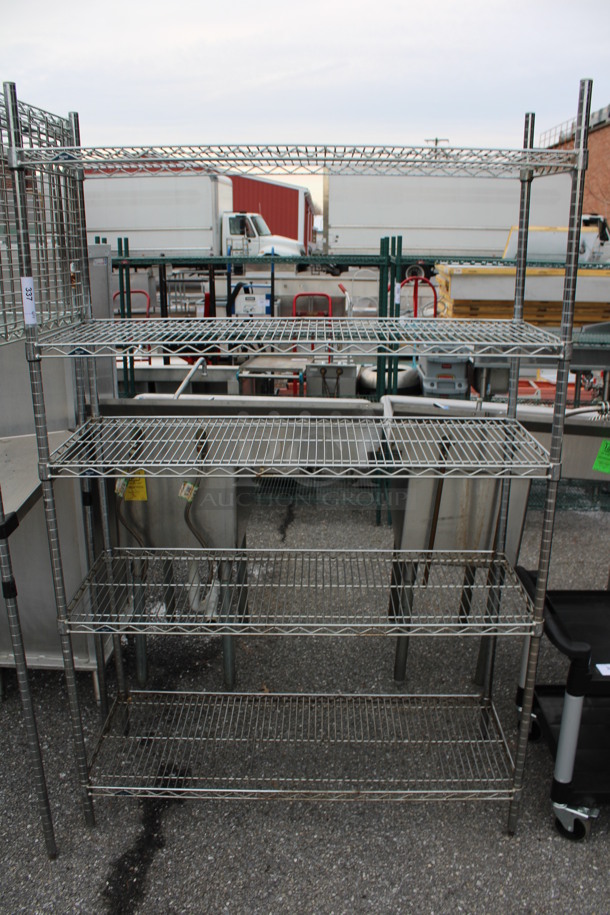 Chrome Finish 5 Tier Shelving Unit. BUYER MUST DISMANTLE. PCI CANNOT DISMANTLE FOR SHIPPING. PLEASE CONSIDER FREIGHT CHARGES. 48x18x74 - Image 1 of 4