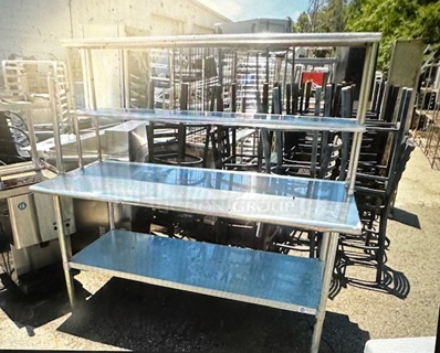 One Stainless Steel Table With Under Shelf, And 2 Over Shelves. 72X30X66