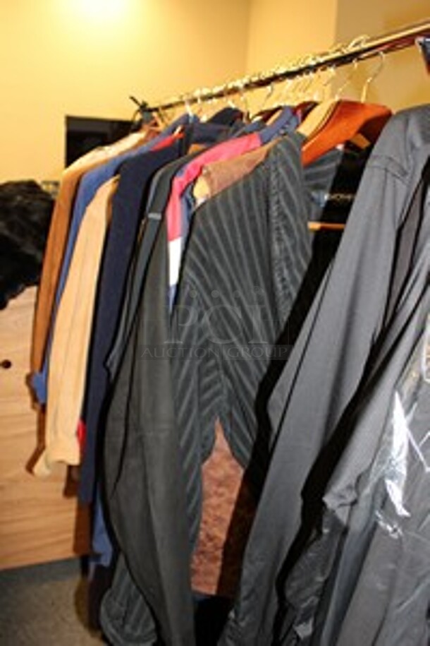 ALL ONE MONEY! Clothing Rack Lot of Various Items Including Mens' Robes, Fila Jackets, Justin Harvey Shirts, and Champion Jackets. Sizes Appear to be Size L. Clothing Racks Not Included!
