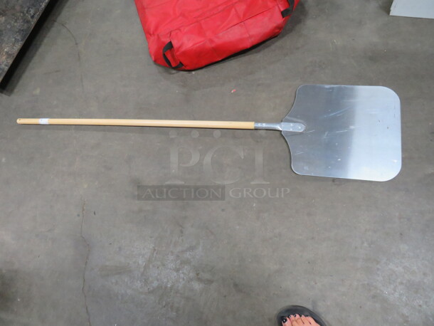 One NEW Wooden Handle  Pizza Paddle. - Image 1 of 1