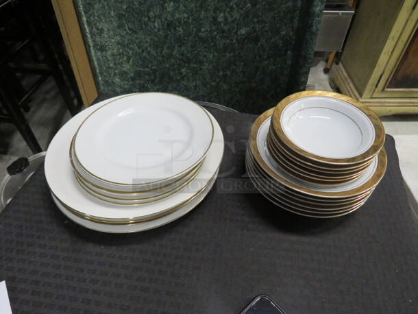 One Lot Of Assorted Gold Rimmed Dishes.