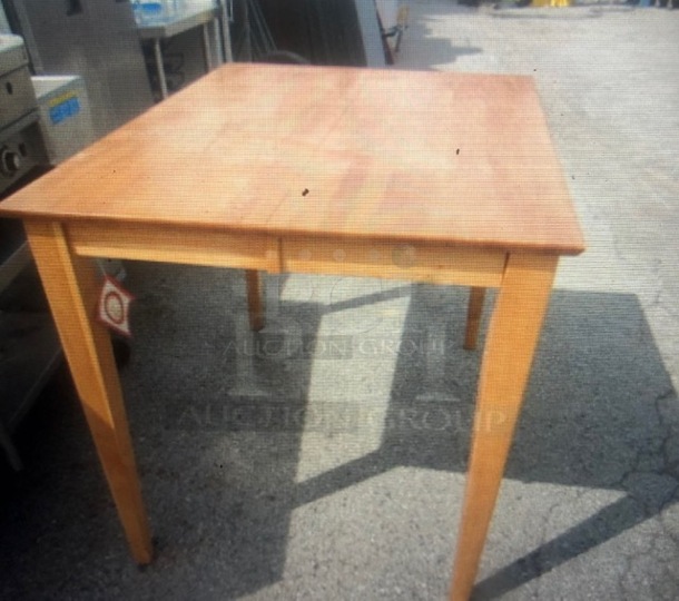 One NEW Wooden Table With Leaf. 54X36X36. With Leaf 54X54X36. Assembly Required.