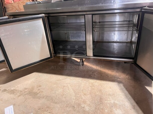 True 93" Pizza Prep Table W/Refrigerated Base on Casters, 115v, Stainless Steel, Missing Center Top Lid and Cutting Board. Very Clean, NOT TESTED 
Model TPP-93 - Image 6 of 6
