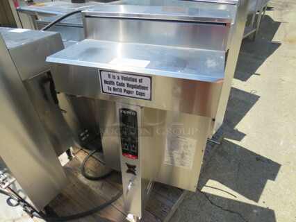 One Fetco Twin Coffee Brewer. Model# CBS-2042E. 120-208/240 Volt. 
