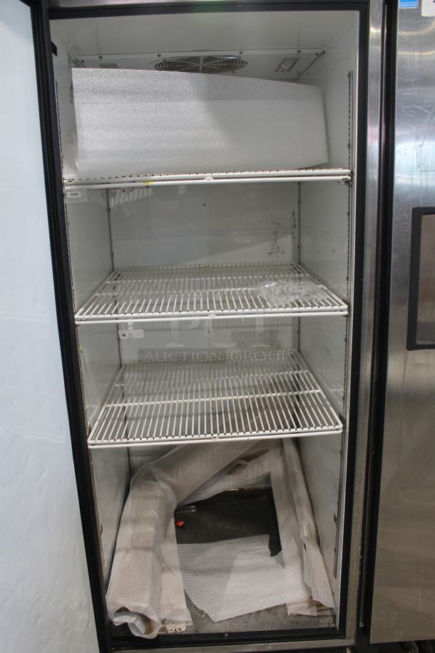 2015 True TG1R-1S ENERGY STAR Stainless Steel Commercial Single Door Reach In Cooler w/ Poly Coated Racks on Commercial Casters. 115 Volts, 1 Phase. Tested and Working! - Image 6 of 7