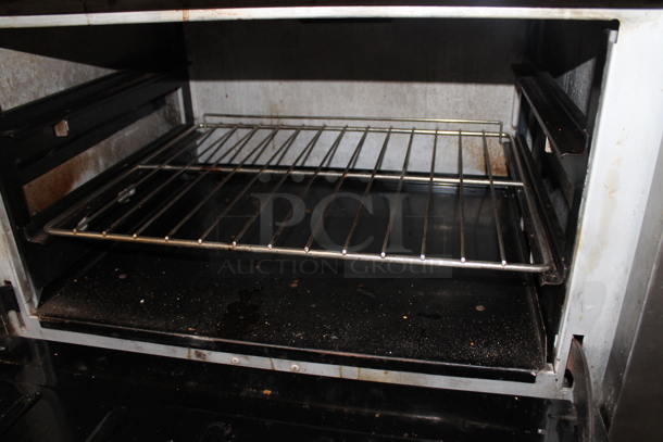 Vulcan Stainless Steel Commercial Natural Gas Powered 6 Burner Range w/ Flat Top, 2 Ovens, Over Shelf and Back Splash.  - Image 8 of 11