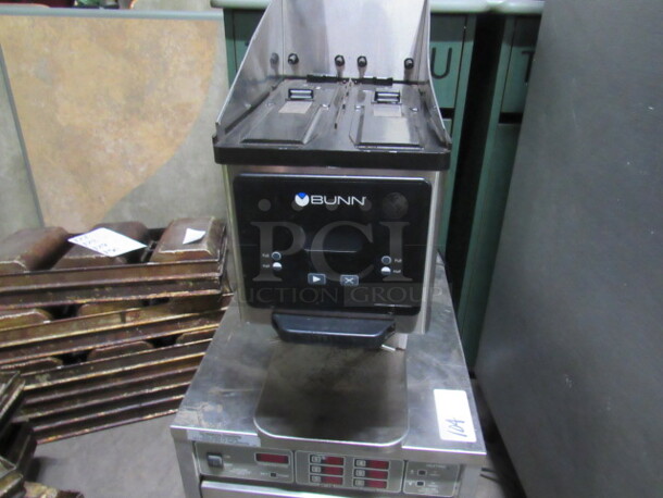 One Bunn Grinder. No Hoppers. Model# MHG. 120 Volt. 9X16X23