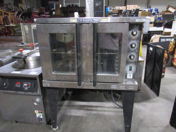 One Bakers Pride Electric Convection Oven, With 2 Racks. 208 Volt. 1 or 3 Phase. Model# 4548COER21. 38X38X55.5