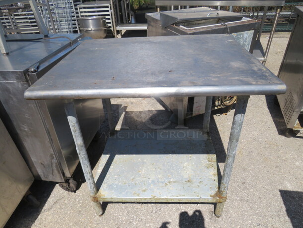 One Stainless Steel Table With Under Shelf.  36X30X36 - Image 1 of 1