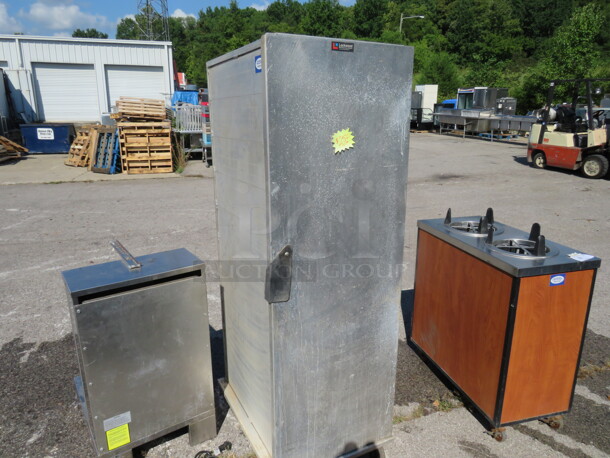 One 1 Door Aluminum Lockwood Cabinet On Casters. Model# CA-67-ES-40. 21.5X29X66 - Image 1 of 2
