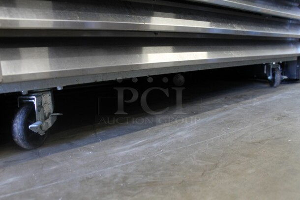 Avantco 178A49RHC Stainless Steel Commercial 2 Door Reach In Cooler w/ Poly Coated Racks on Commercial Casters. 115 Volts, 1 Phase. Tested and Working! - Image 2 of 5