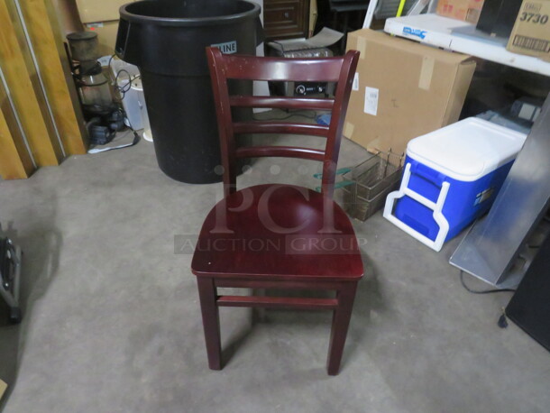 Solid Wooden Chair In A Mahogany Finish. 2XBID. THESE CHAIRS LOOK BRAND NEW!!!!