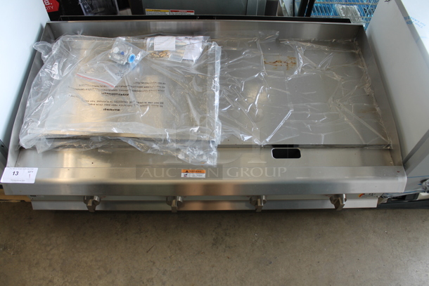 BRAND NEW SCRATCH AND DENT! 2023 Cooking Performance Group CPG 351GTCPG48NL Stainless Steel Commercial Countertop Natural Gas Powered Flat Top Griddle w/ Thermostatic Controls. 120,000 BTU.  - Image 1 of 5